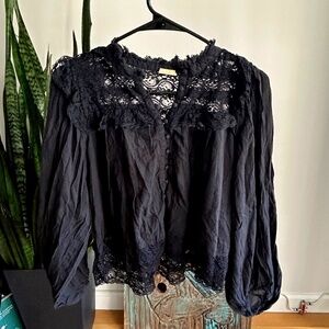 Black sheer flowy blouse with lace detail